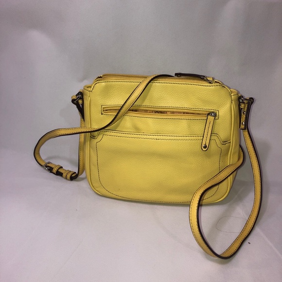 Tignanello Handbags - Pale Yellow Tignanello cross body purse Tignanello Handbags - Pale Yellow Tignanello cross body purse